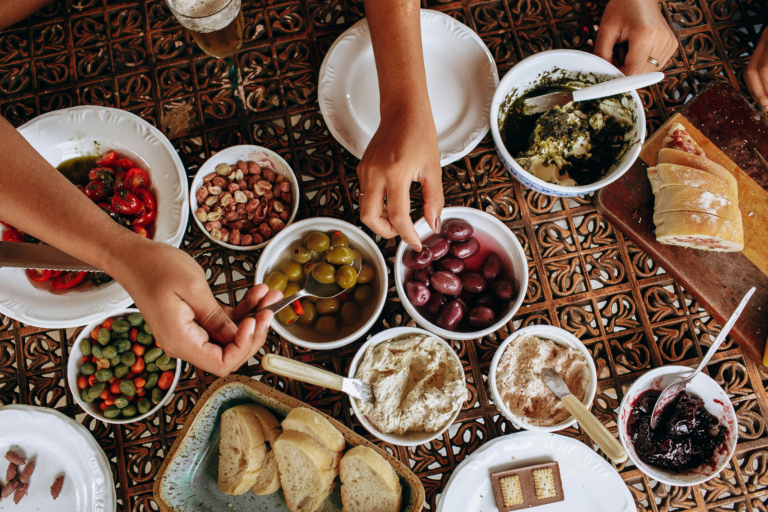 People on a table enjoying Spanish food