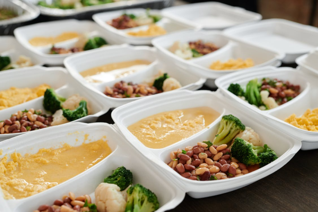 Plates filled with nutritious food, beans, and greens